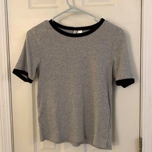 Grey tee with black collar and sleeve lining